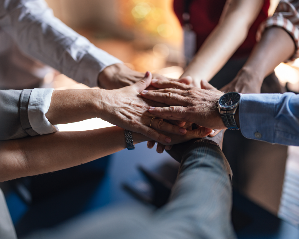 Teamwork hands joined together